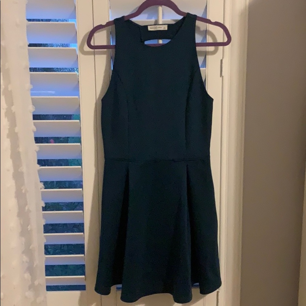 Emerald flare dress with open back